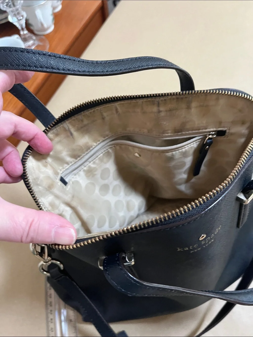 kate spade black leather satchel with gold-tone hardware